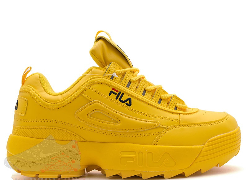 yellow and white fila disruptor